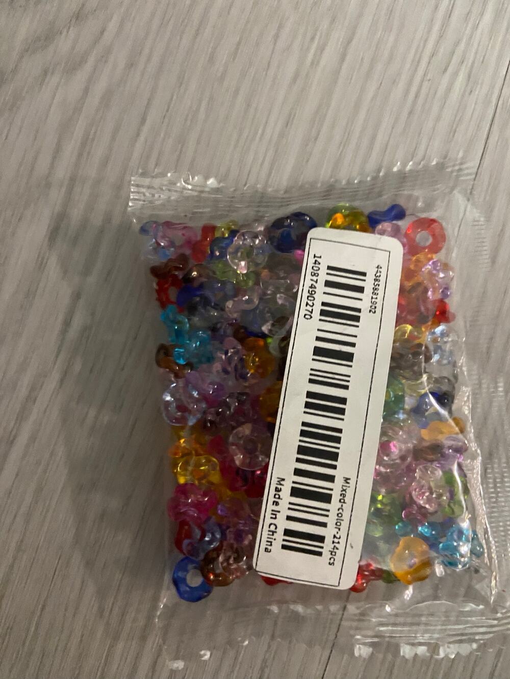 100 piece clear, colorful, wavy spacer beads